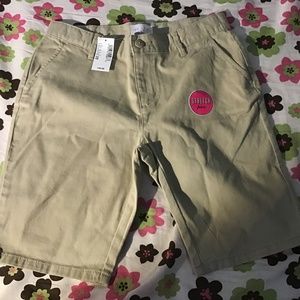 tan Bermuda shorts